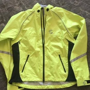 Ladies XL New without tags. Vent in back. 4 pockets in front